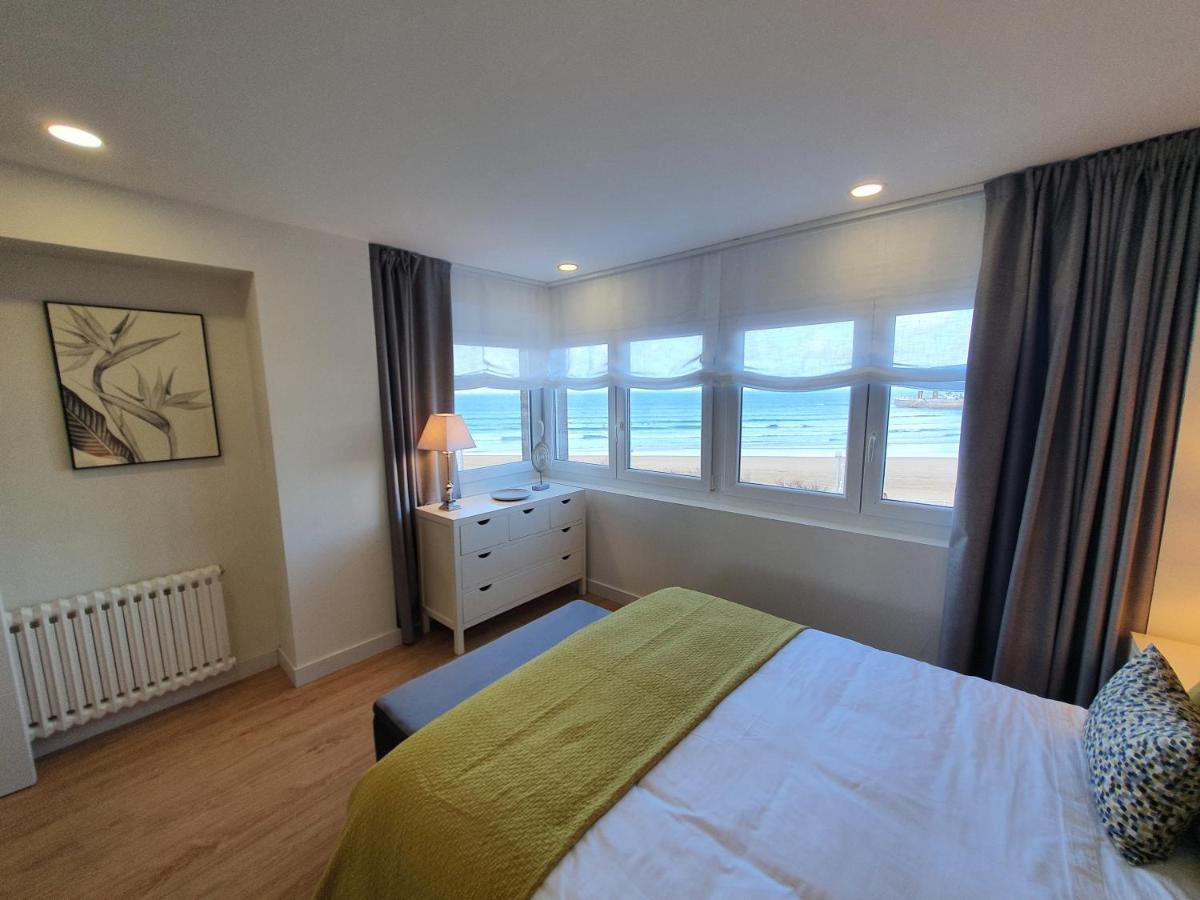 Playa 12 - El lujo de estar en 1ª Línea de playa Apartamento Gijón Exterior foto